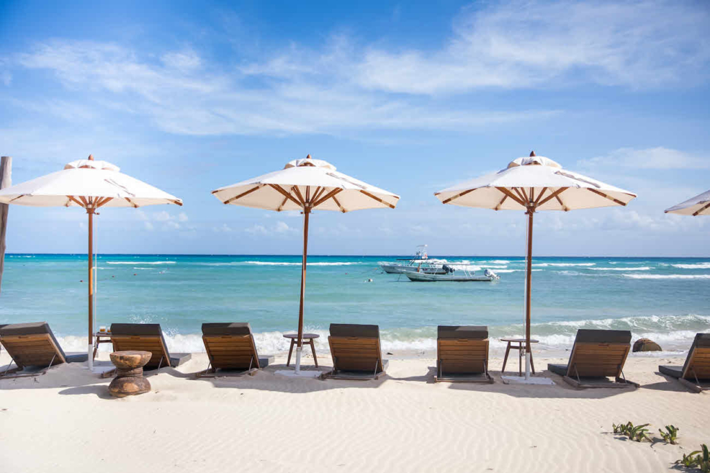Luxury beach homes on a golf course in Playa Del Carmen, MX.